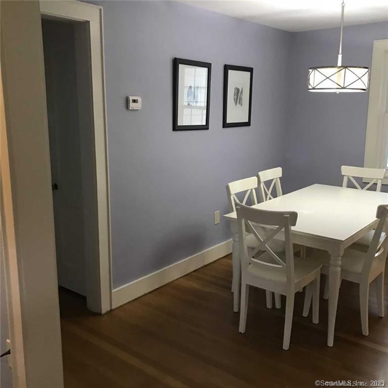 39 Masons Island Road Stonington, CT 06355 - Photo 10 of 16 a dining room with furniture and window