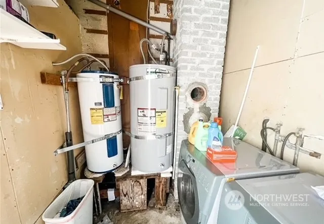 a view of living room with furniture and a window