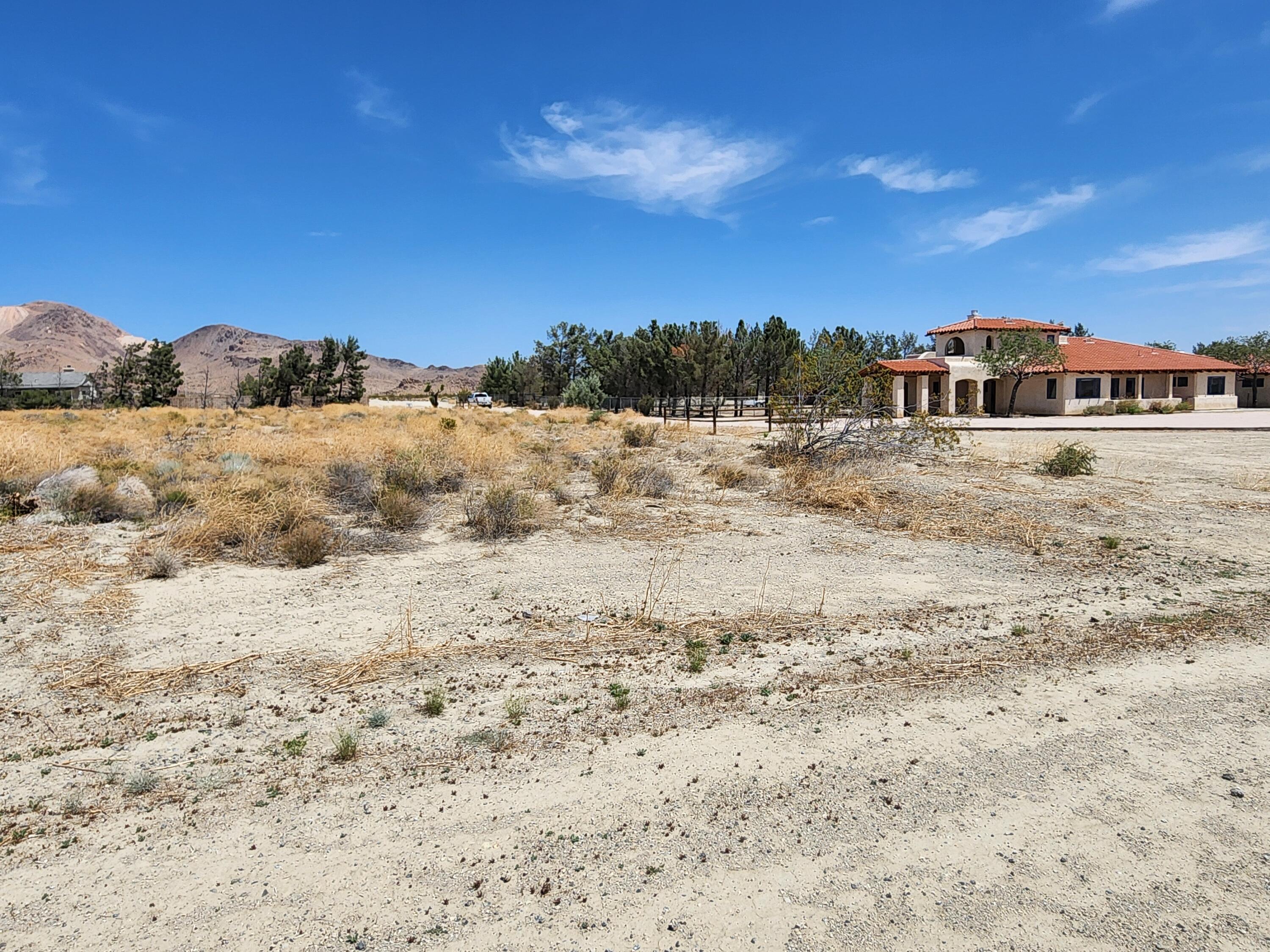 0 Sharon Street Mojave, CA 93501 - Photo 2 of 6 a view of a large building with a mountain view