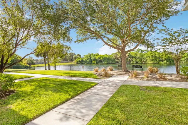 front view of a house with a garden