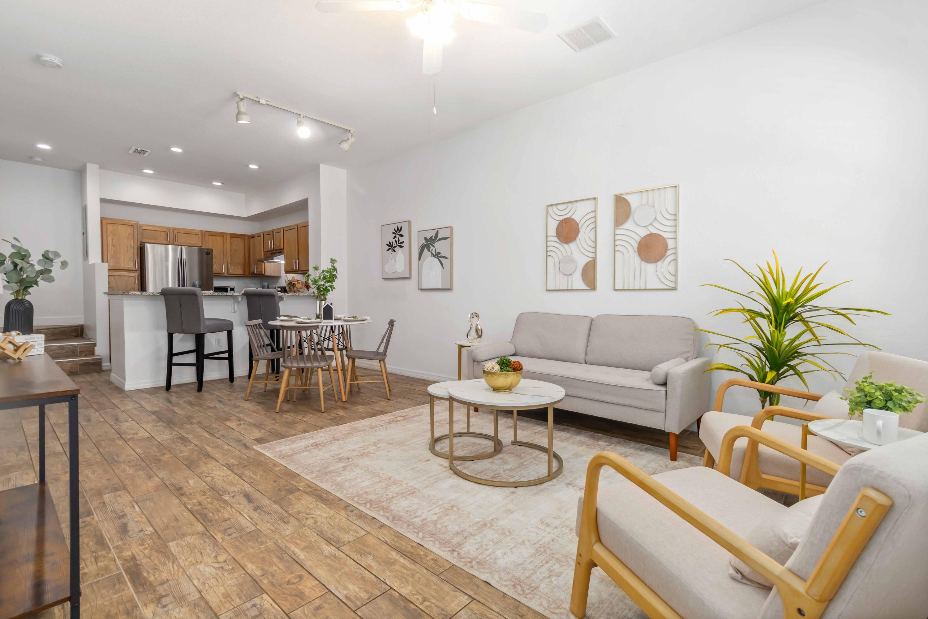 110 Turpial Way, Unit 102 Melbourne, FL 32901 - Photo 14 of 14 a living room with furniture and a table