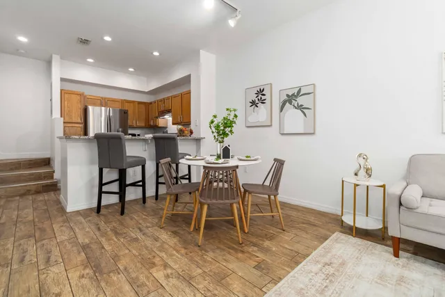 a living room with furniture and a table