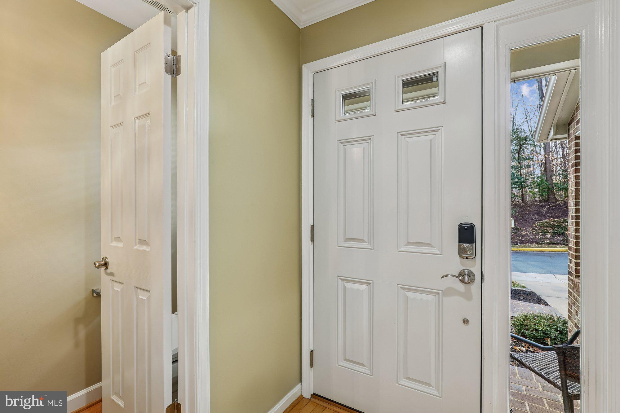 8019 Galla Knoll Circle Springfield, VA 22153 - Photo 3 of 57 a view of a hallway with front door