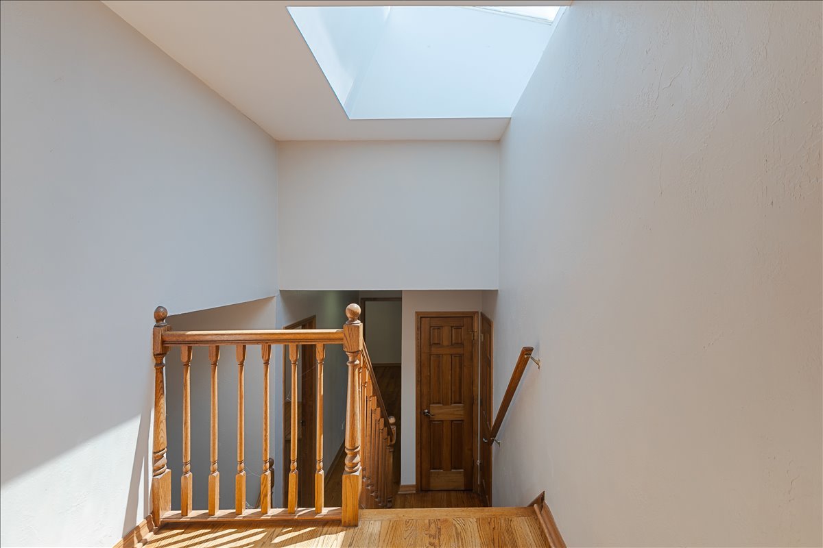 33 Half Day Road Lincolnshire, IL 60069 - Photo 15 of 38 a view of stairs with wooden floor