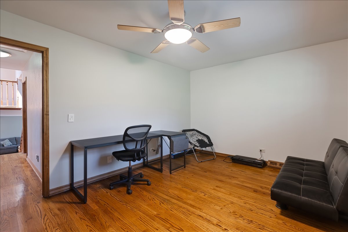 33 Half Day Road Lincolnshire, IL 60069 - Photo 21 of 38 a room with furniture and wooden floor