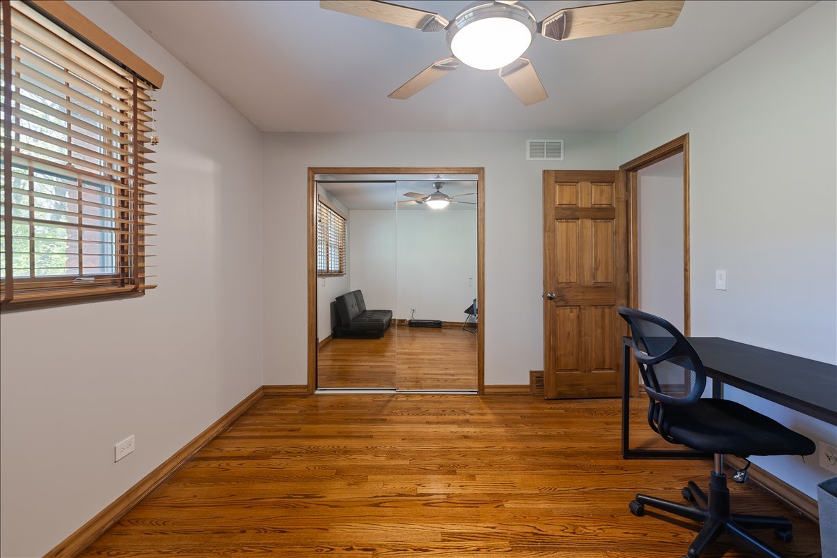33 Half Day Road Lincolnshire, IL 60069 - Photo 22 of 38 a view of empty room with wooden floor
