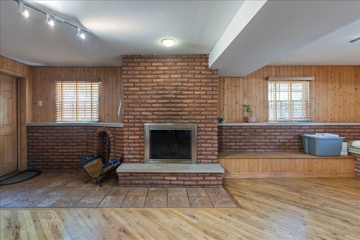 33 Half Day Road Lincolnshire, IL 60069 - Photo 24 of 38 a living room with furniture and a fireplace