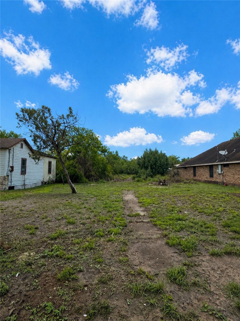 113 Sidbury Street Alice, TX 78332 - Photo 2 of 2 a view of a house with a big yard