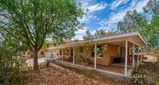 3835 West Ridgecrest Boulevard Ridgecrest, CA 93555 - Photo 9 of 50 a view of a house with a patio