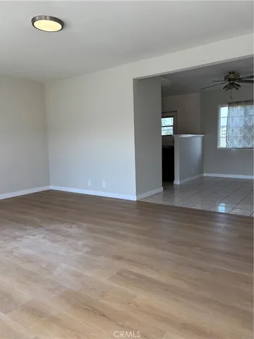 a view of a kitchen with furniture and window
