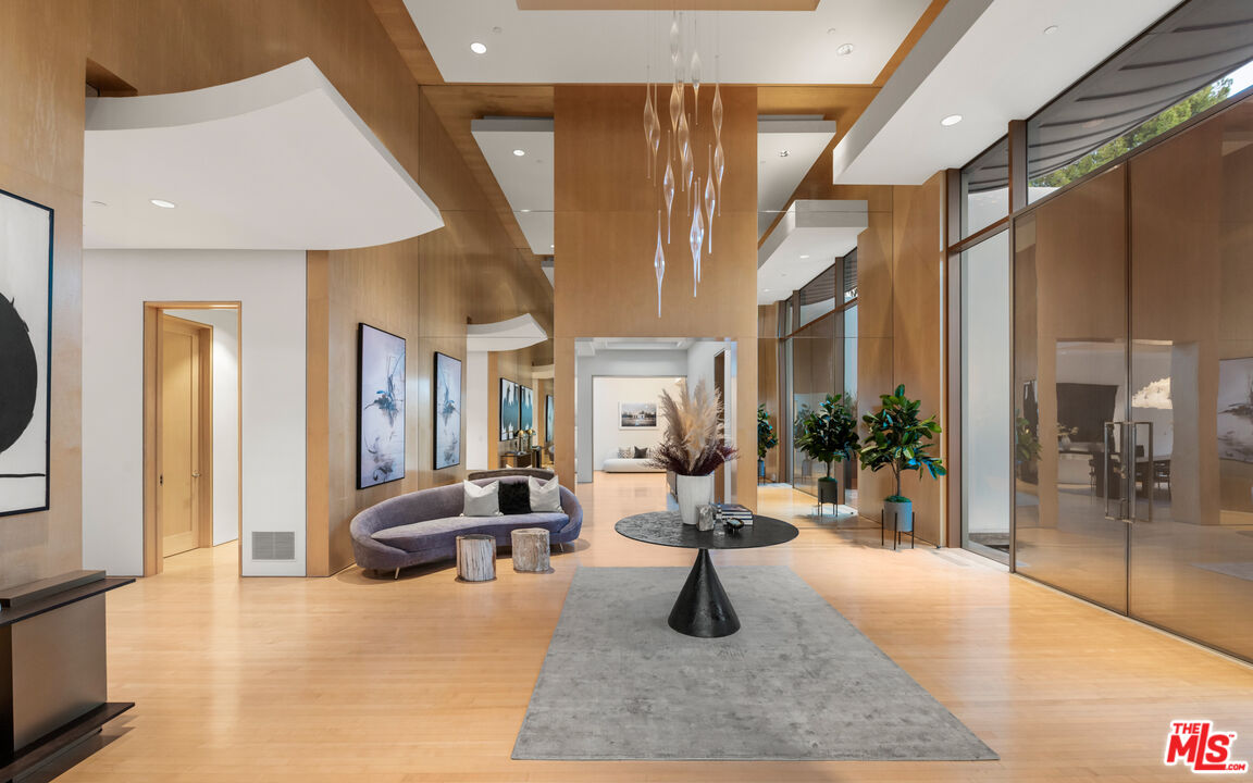 72 Beverly Park Beverly Hills, CA 90210 - Photo 16 of 38 a living room with furniture