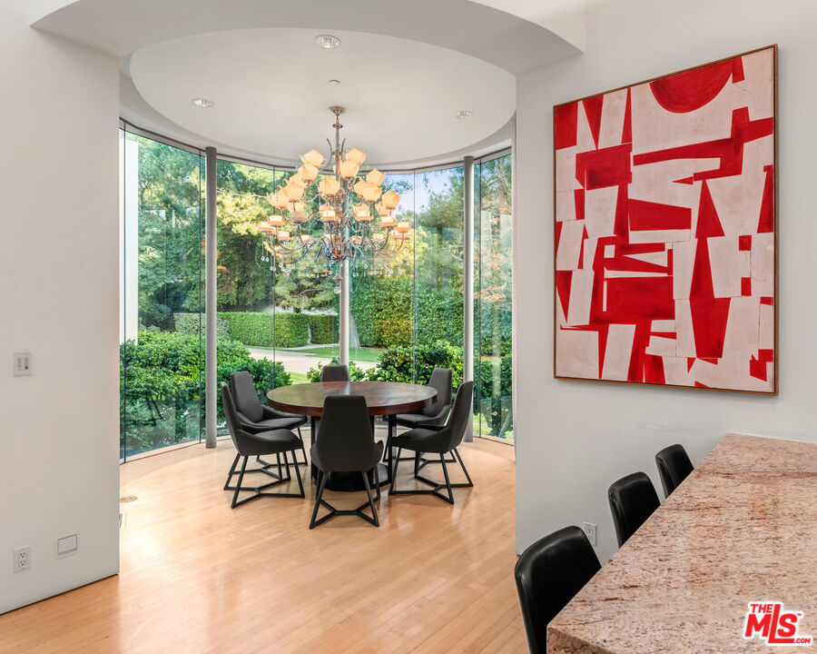 72 Beverly Park Beverly Hills, CA 90210 - Photo 19 of 38 a view of a dining room with furniture window and outside view