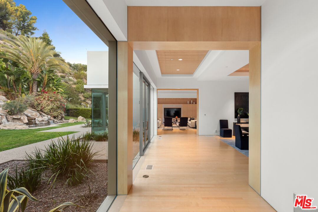 72 Beverly Park Beverly Hills, CA 90210 - Photo 22 of 38 a view of a living room and a yard