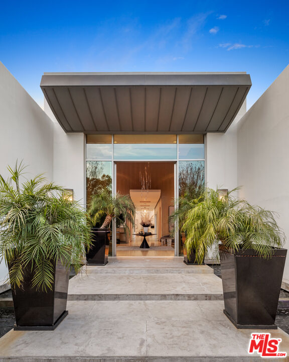 72 Beverly Park Beverly Hills, CA 90210 - Photo 10 of 38 a living room with furniture