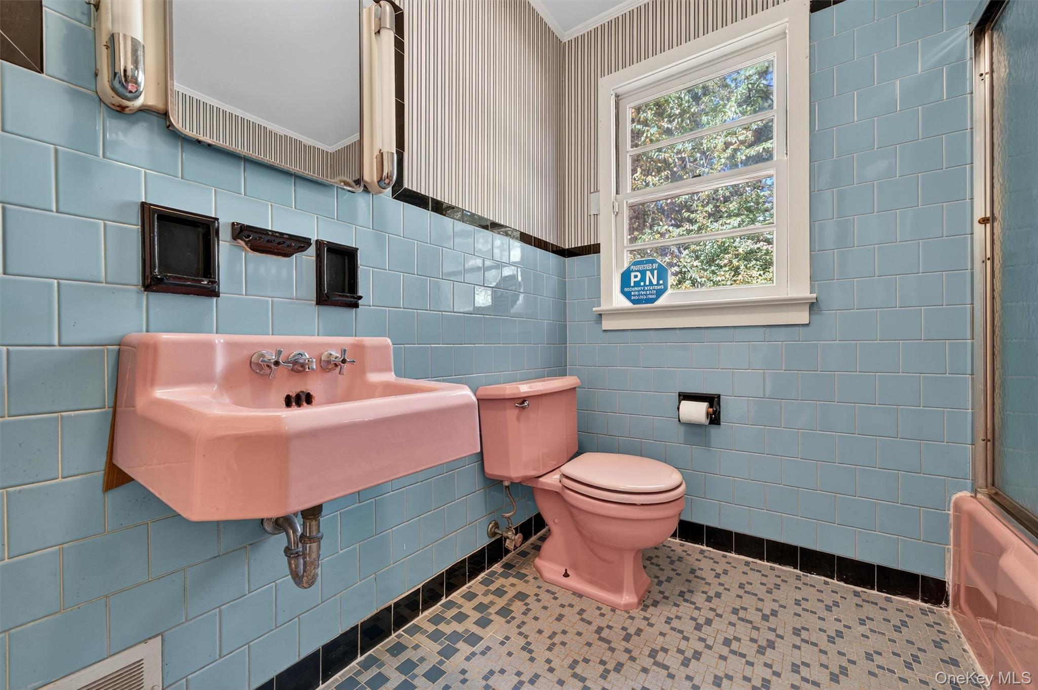 12 Mid Oaks Road Monroe, NY 10950 - Photo 33 of 44 Bathroom featuring tile patterned flooring, tile walls, bath / shower combo with glass door, and wallpapered walls
