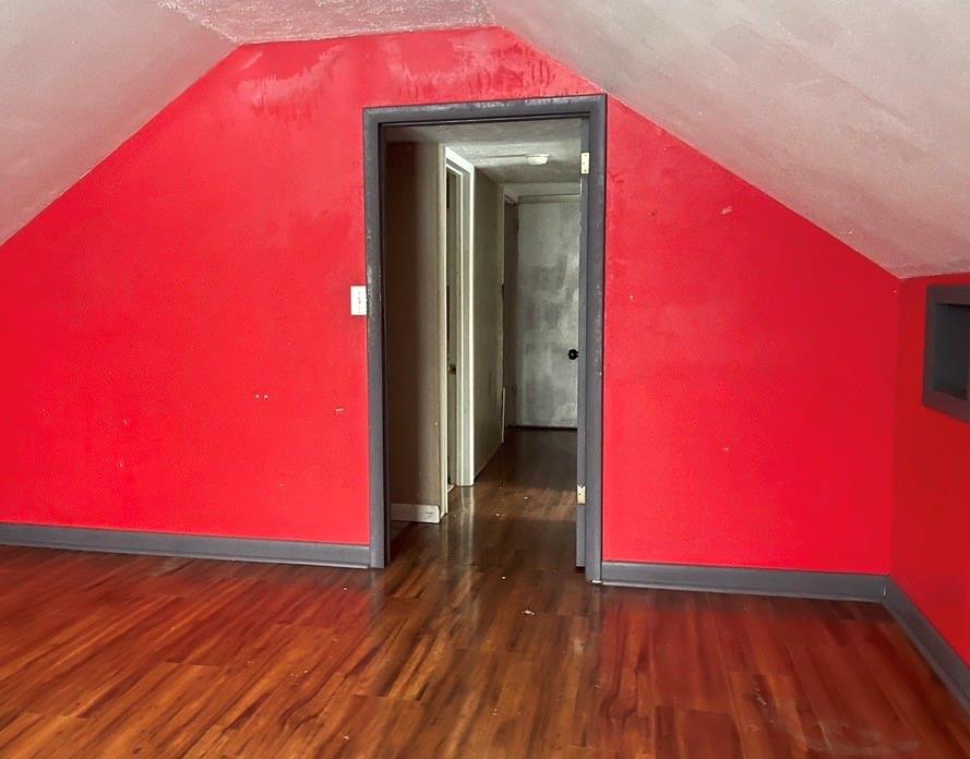 88 Fleming Road Grove City, PA 16127 - Photo 14 of 20 a view of a room with wooden floor and a bench