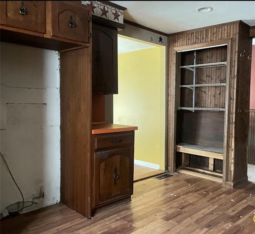 88 Fleming Road Grove City, PA 16127 - Photo 7 of 20 a view of an empty room with wooden floor and a window