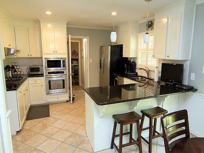 4513 Connell Drive Raleigh, NC 27612 - Photo 7 of 21 Has stainless steel appliances & granite countertops. Kitchen