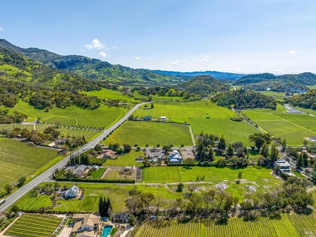 a view of a city with mountains in the background
