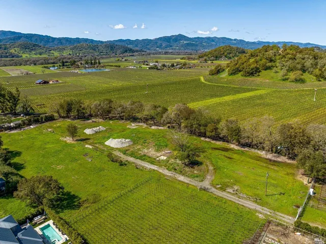 a view of a city with a lake