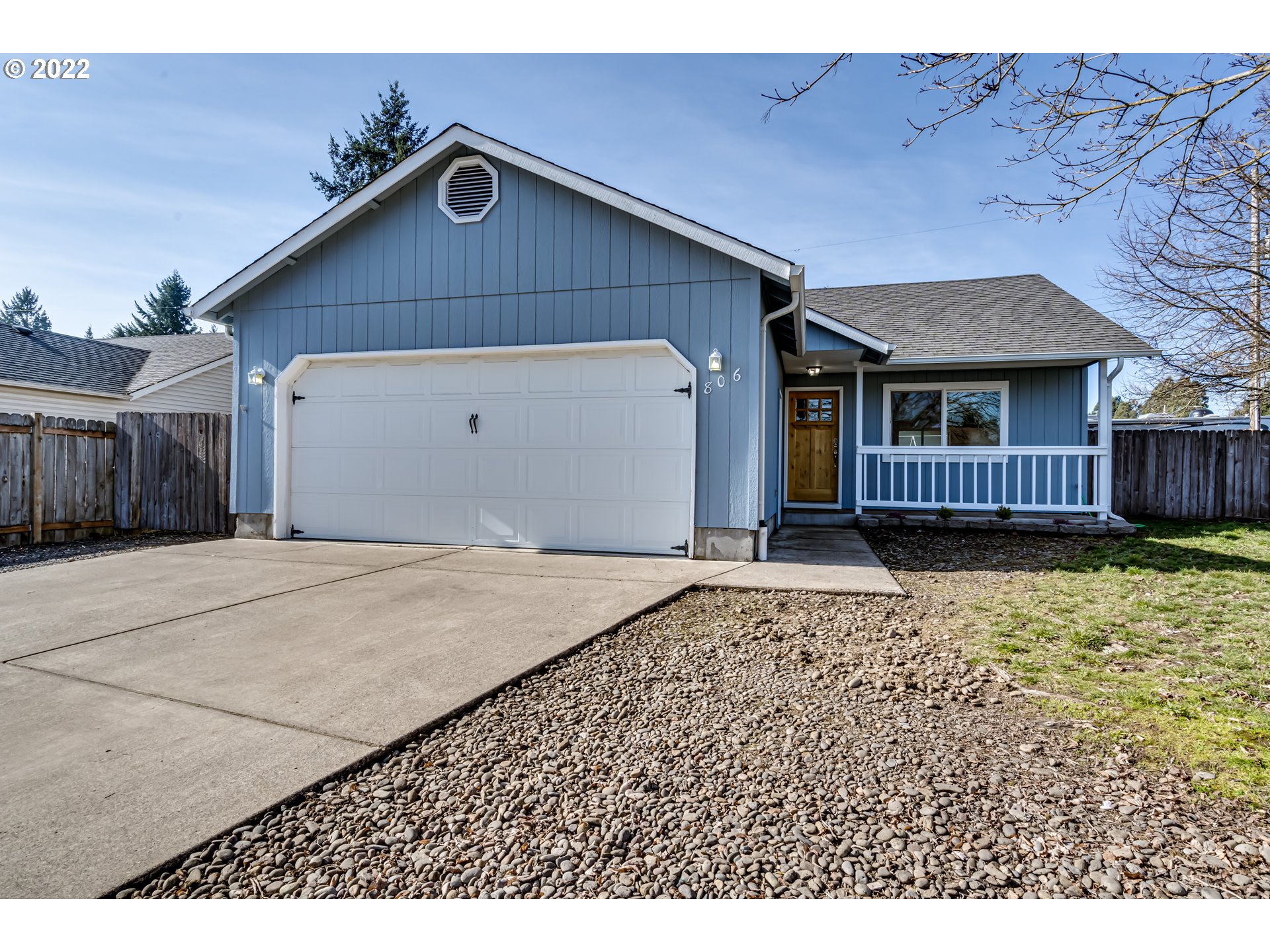 806 Hazelnut Lane Springfield, OR 97478 - Photo 2 of 28 a front view of a house with a yard