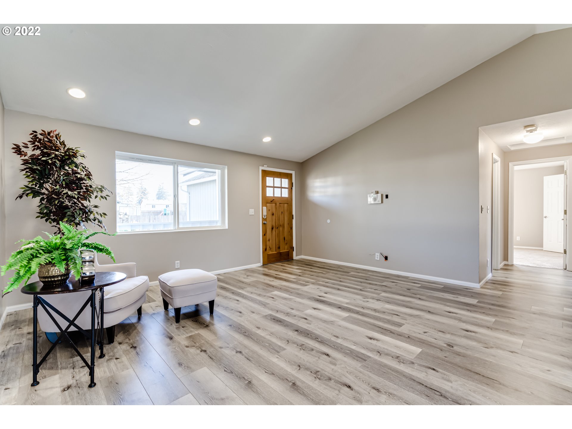 806 Hazelnut Lane Springfield, OR 97478 - Photo 6 of 28 a view of a livingroom with furniture and a potted plant