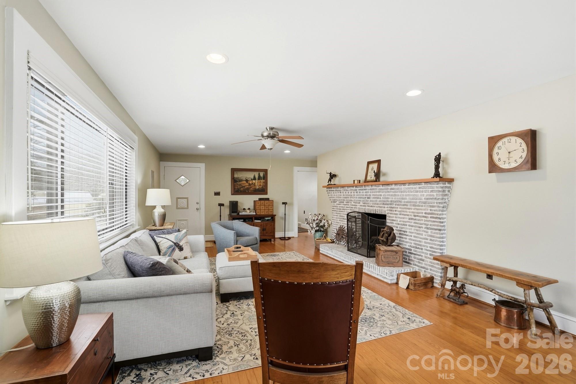 7511 Old Mocksville Road Salisbury, NC 28144 - Photo 13 of 48 a living room with furniture and a fireplace