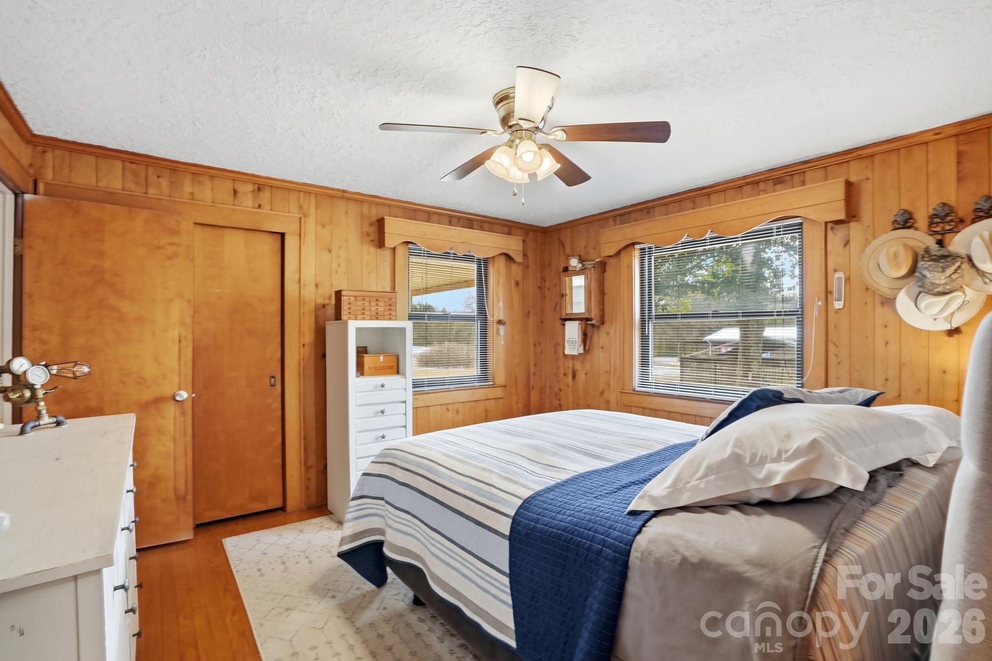7511 Old Mocksville Road Salisbury, NC 28144 - Photo 21 of 48 a bedroom with a large bed and a window