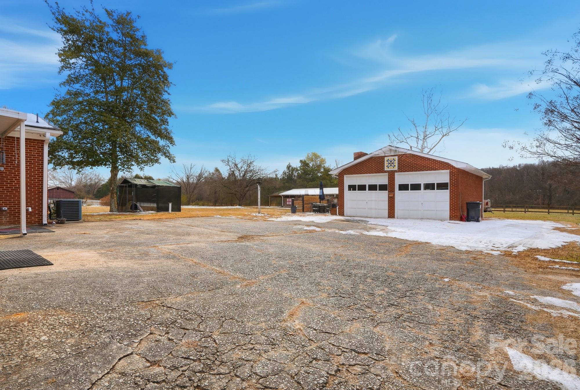 7511 Old Mocksville Road Salisbury, NC 28144 - Photo 26 of 48 a view of house with a yard