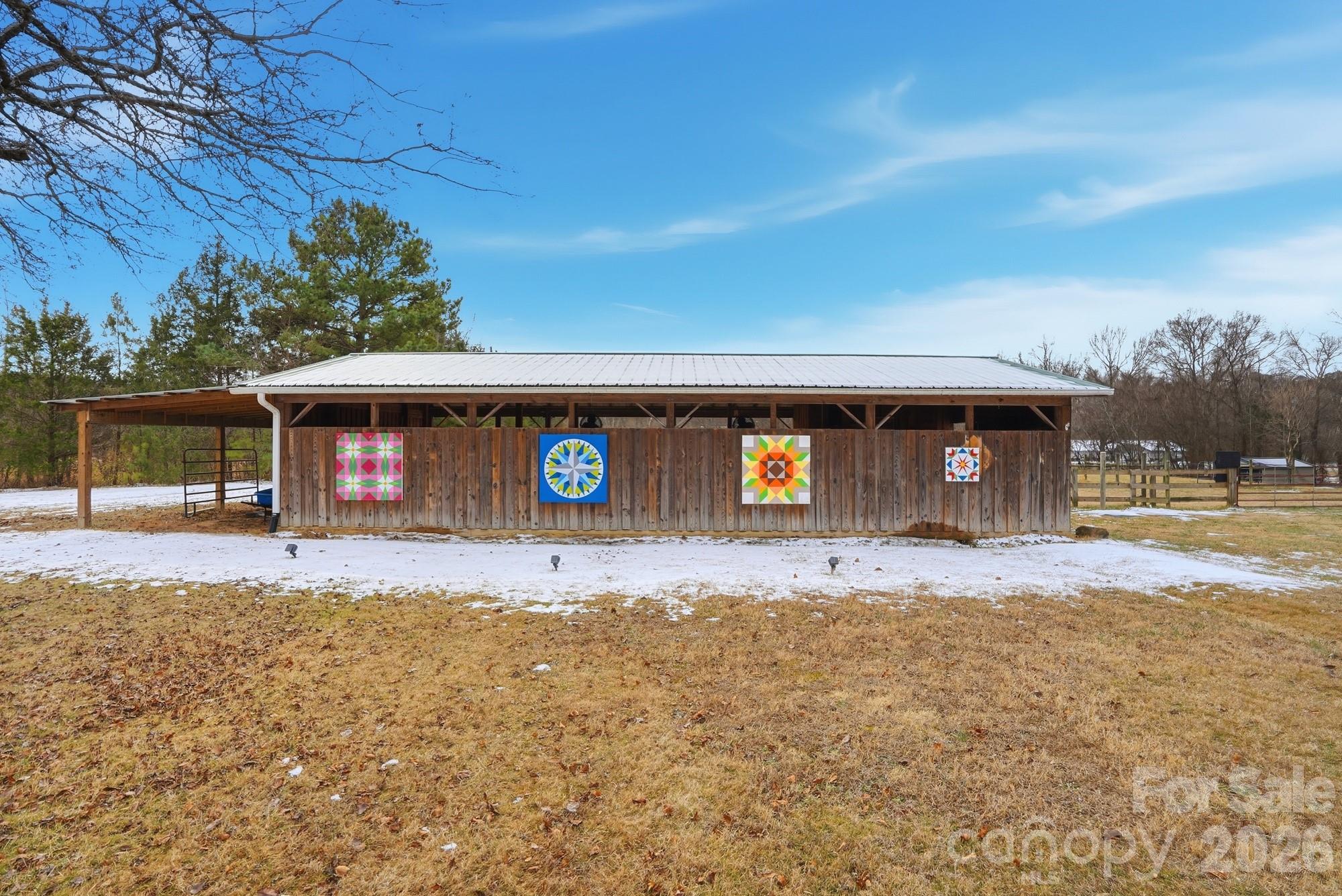 7511 Old Mocksville Road Salisbury, NC 28144 - Photo 32 of 48 a front view of a house with a yard and garage