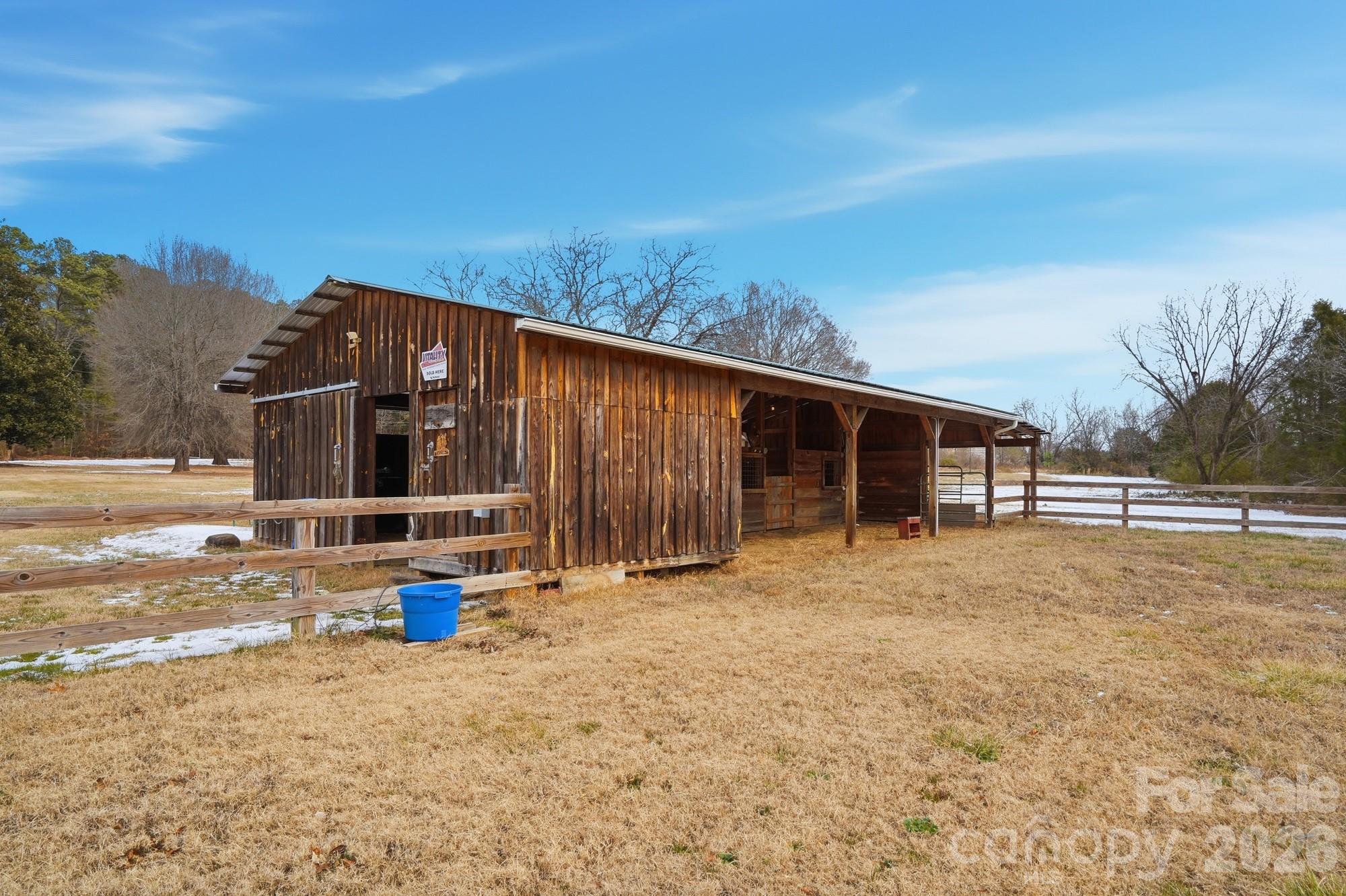 7511 Old Mocksville Road Salisbury, NC 28144 - Photo 33 of 48 a view of a house with backyard and sitting area