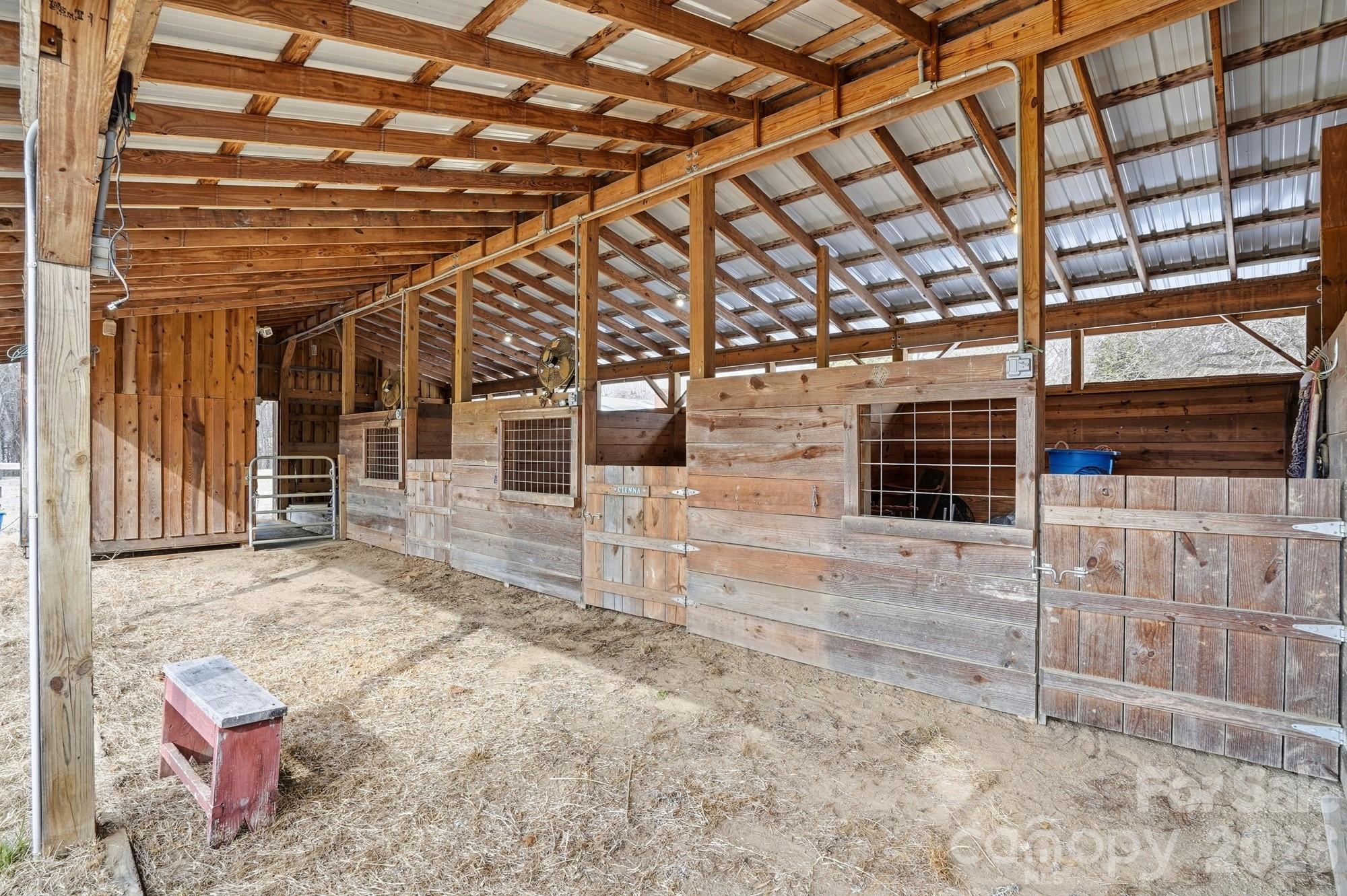 7511 Old Mocksville Road Salisbury, NC 28144 - Photo 36 of 48 a view of a porch with seating space