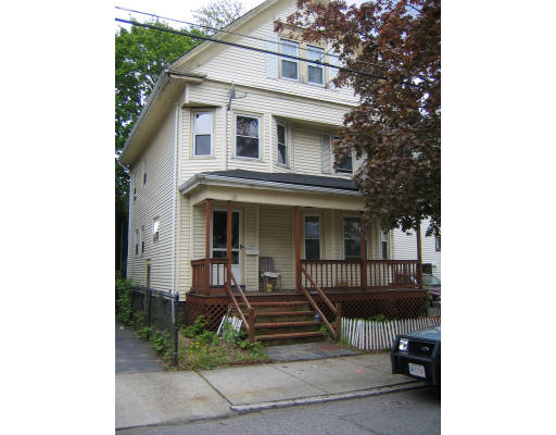 51 Baker Road Everett, MA 02149 - Photo 1 of 10 a view of a house with roof deck