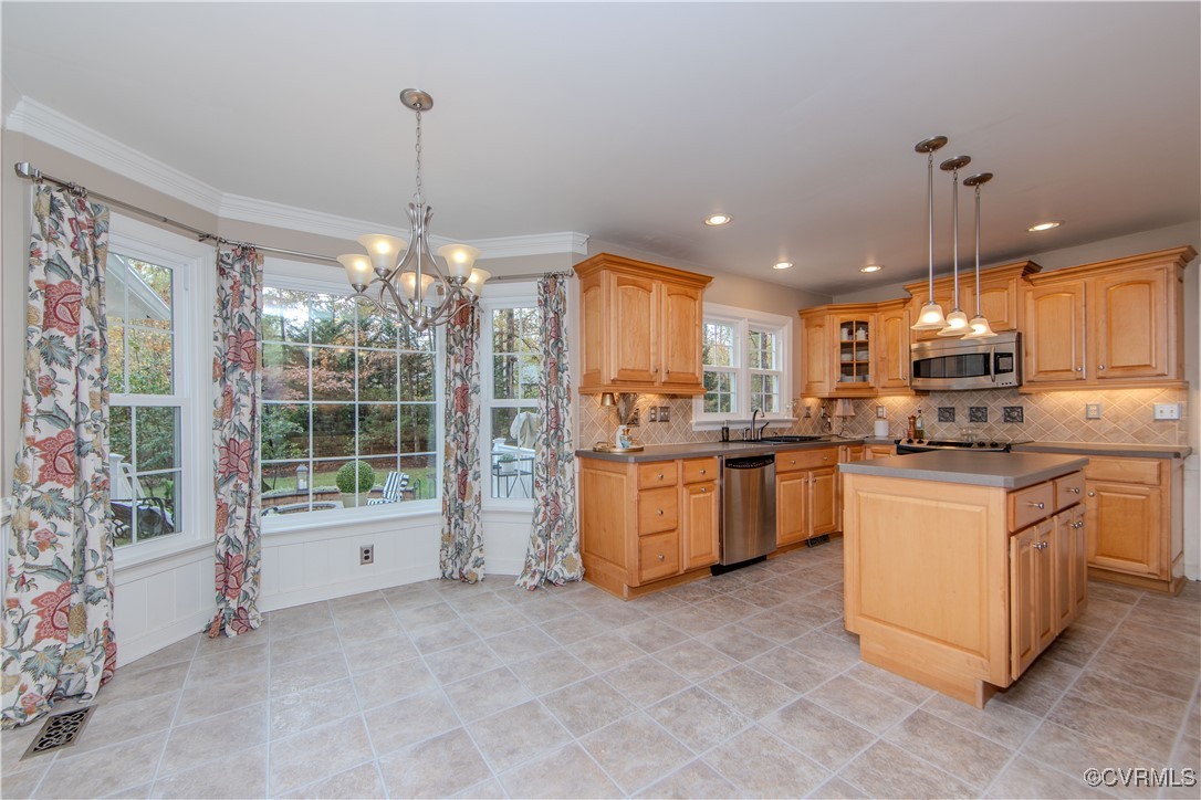 14161 Grangewood Road Midlothian, VA 23113 - Photo 11 of 44 a kitchen with counter top space cabinets and appliances