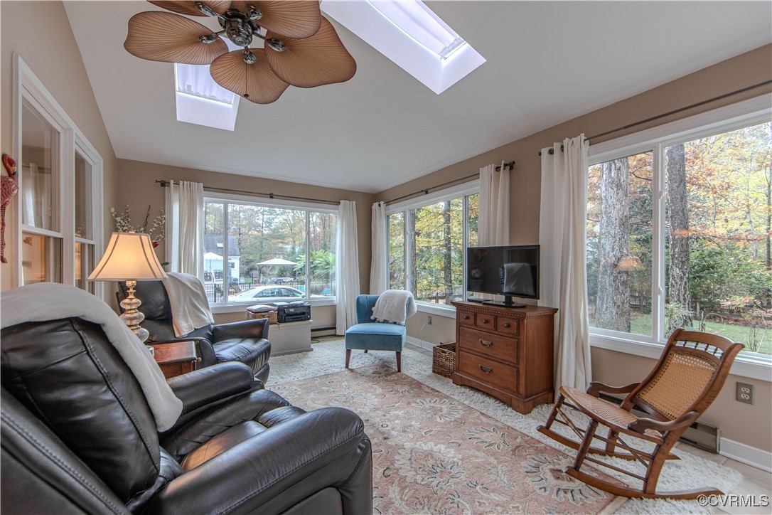 14161 Grangewood Road Midlothian, VA 23113 - Photo 17 of 44 a living room with furniture and a flat screen tv