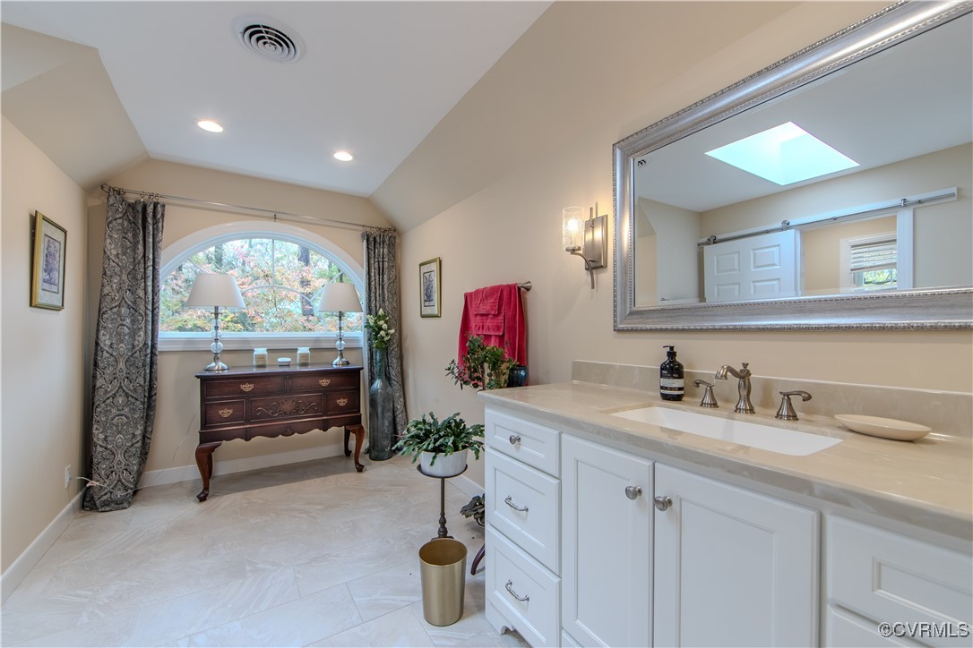 14161 Grangewood Road Midlothian, VA 23113 - Photo 24 of 44 a bathroom with a sink and a mirror