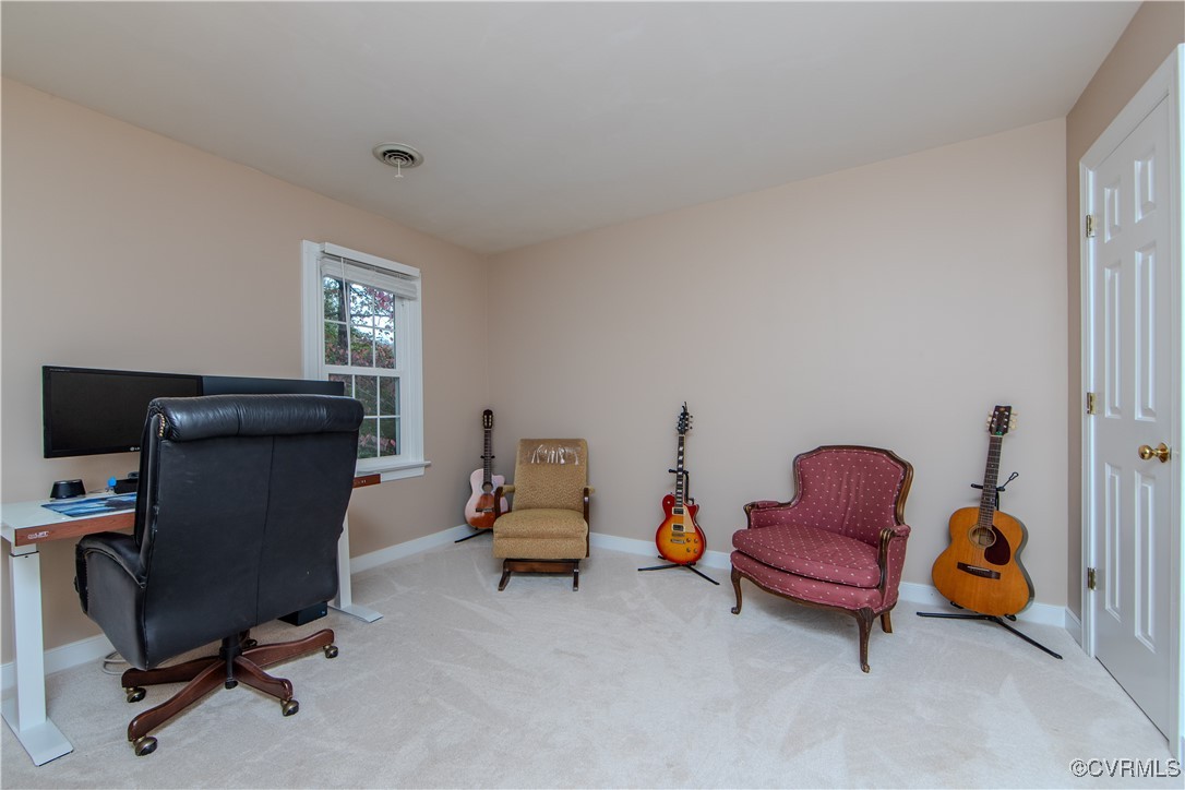 14161 Grangewood Road Midlothian, VA 23113 - Photo 32 of 44 a view of a workspace with furniture and a window