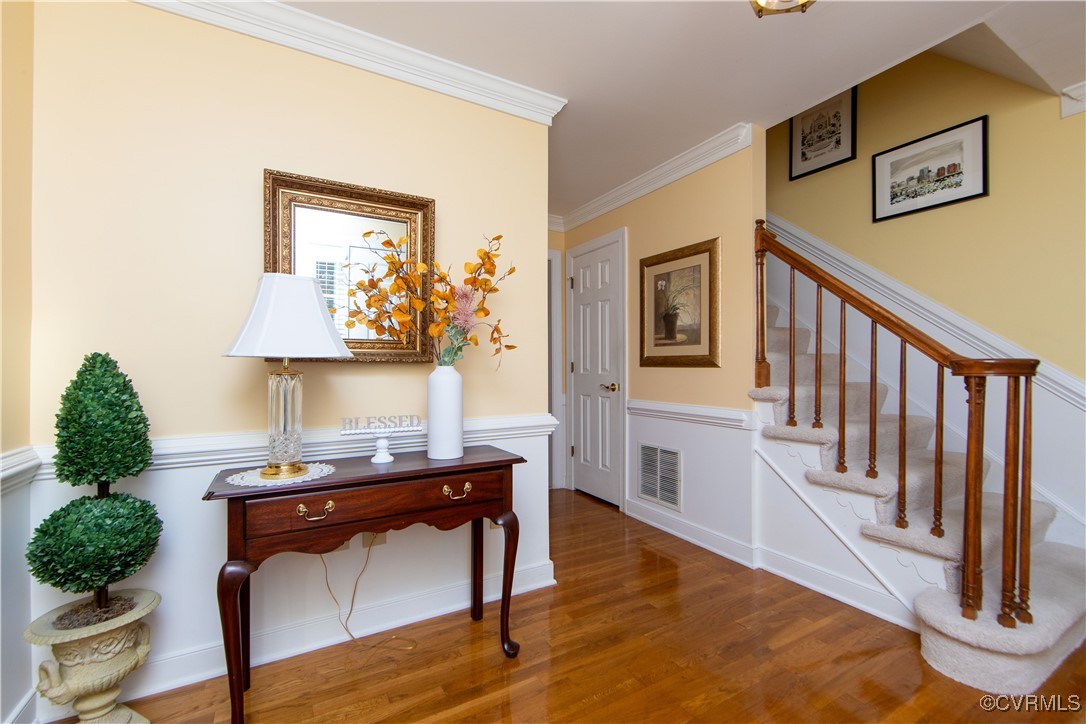 14161 Grangewood Road Midlothian, VA 23113 - Photo 5 of 44 a living room with furniture and a wooden floor