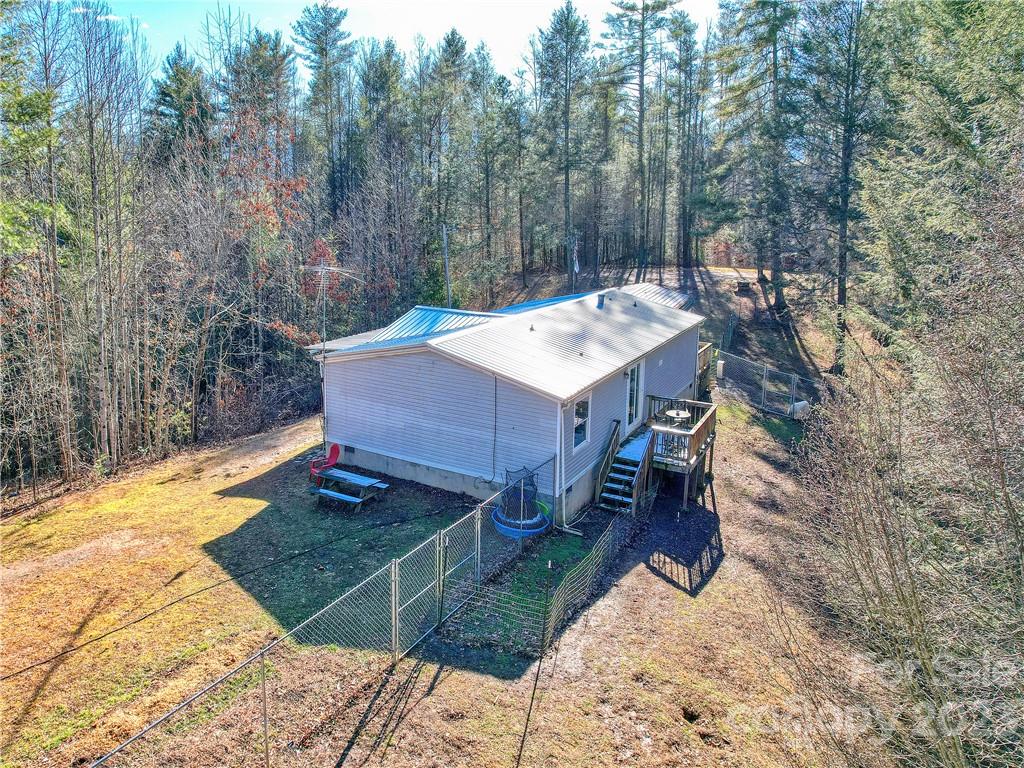 994 Indian Springs Road Clyde, NC 28721 - Photo 3 of 39 a view of a house with backyard and sitting area
