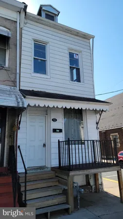 a front view of a house with balcony
