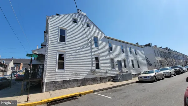 a front view of a house with parking