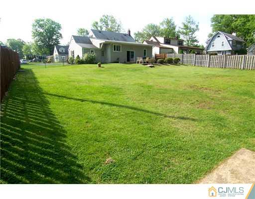 86 West Hill Road Colonia, NJ 07067 - Photo 10 of 10 a front view of house with a garden