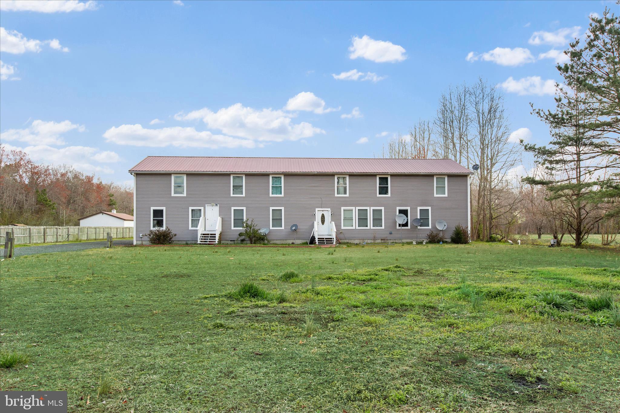 14477 Deer Forest Road Bridgeville, DE 19933 - Photo 3 of 22 a view of a house with backyard porch and garden