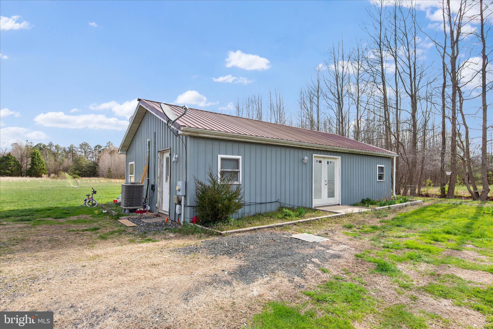 14477 Deer Forest Road Bridgeville, DE 19933 - Photo 6 of 22 a view of a house with backyard and garden