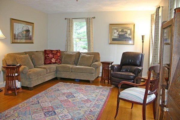 163 Warren Road Townsend, MA 01469 - Photo 3 of 18 a living room with furniture and a window