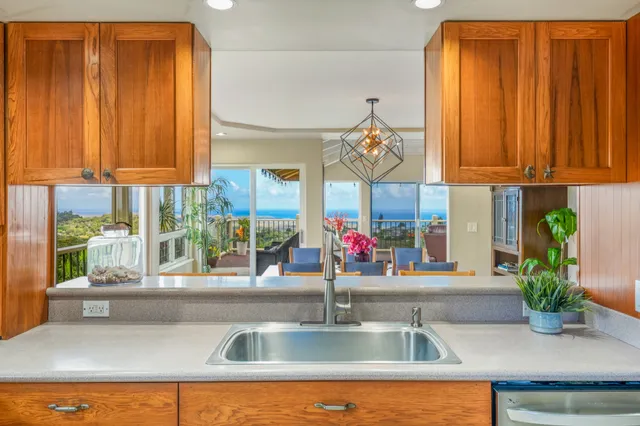 a kitchen with a sink and a window