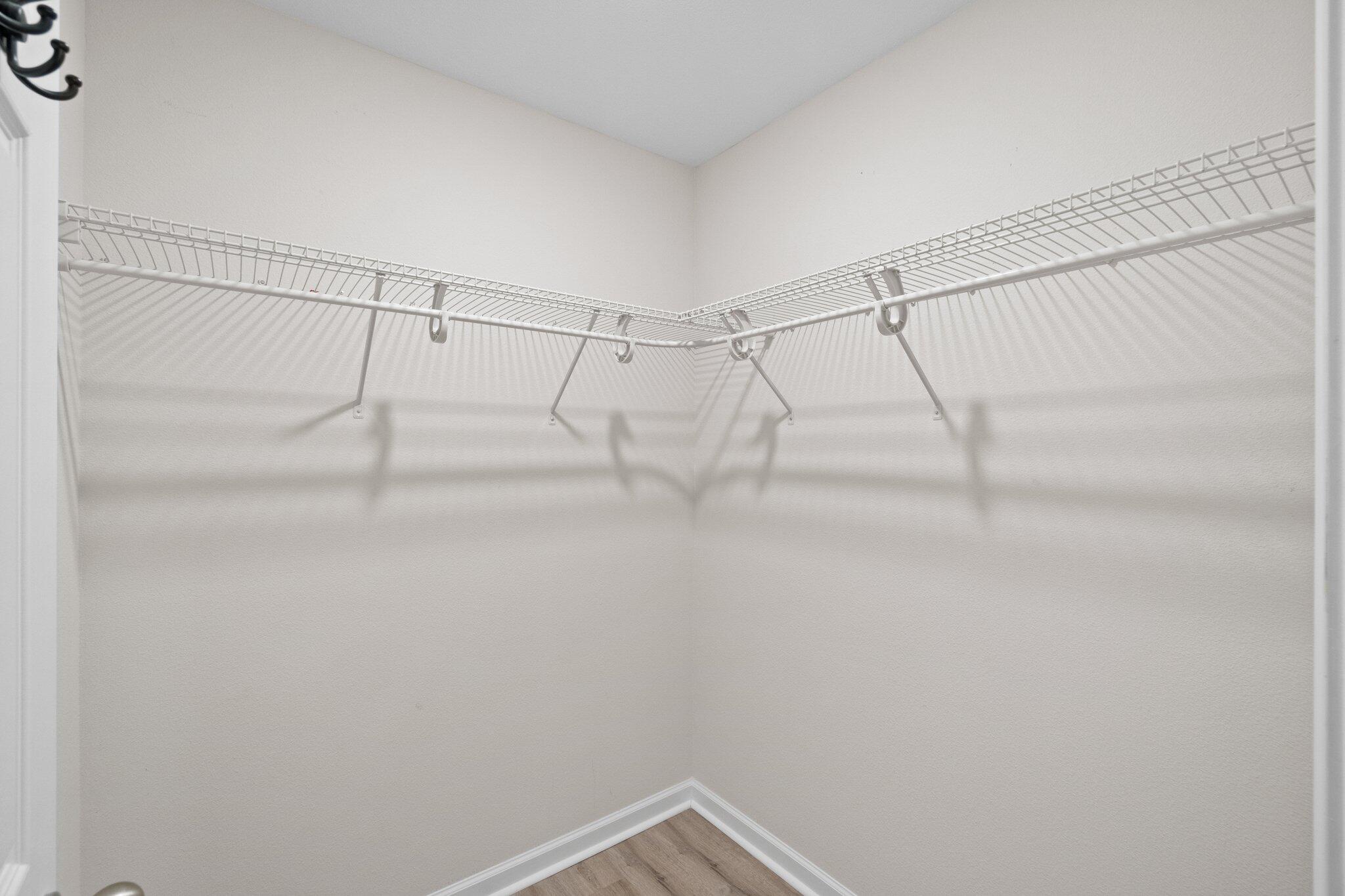 378 Marquis Way Freeport, FL 32439 - Photo 17 of 37 a view of a room with racks on the wall