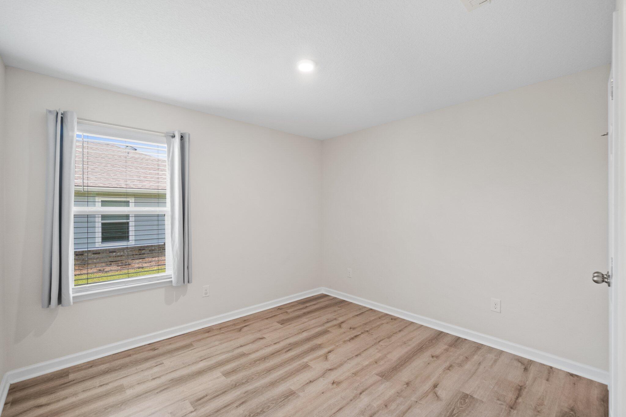 378 Marquis Way Freeport, FL 32439 - Photo 30 of 37 an empty room with a window