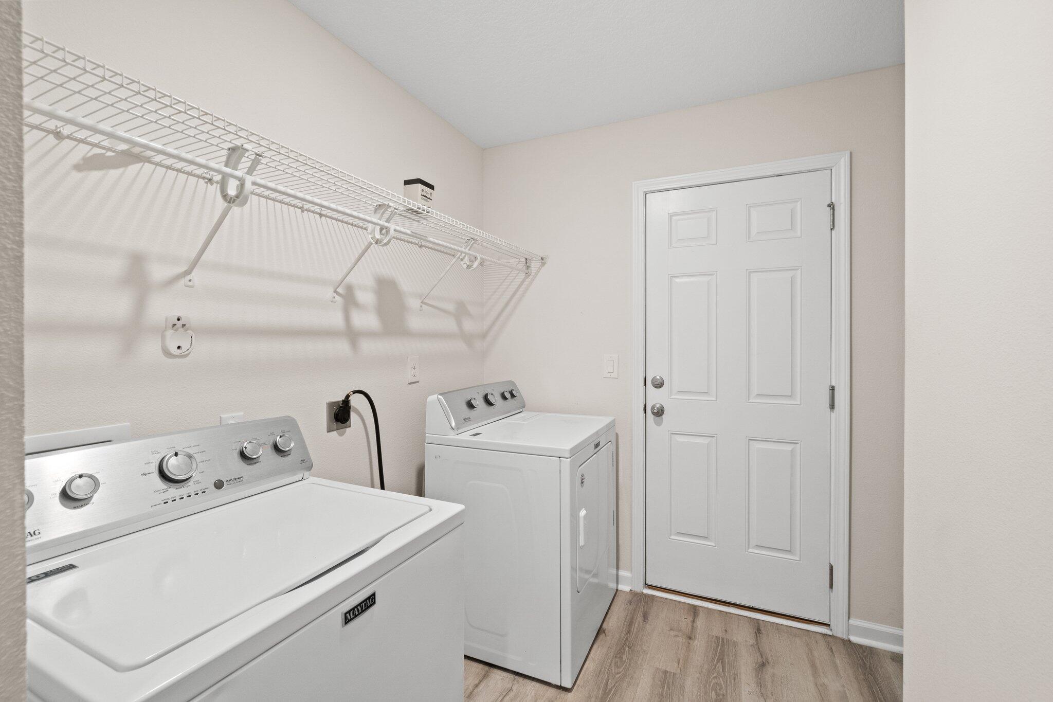 378 Marquis Way Freeport, FL 32439 - Photo 34 of 37 a view of storage and utility room with washer and dryer