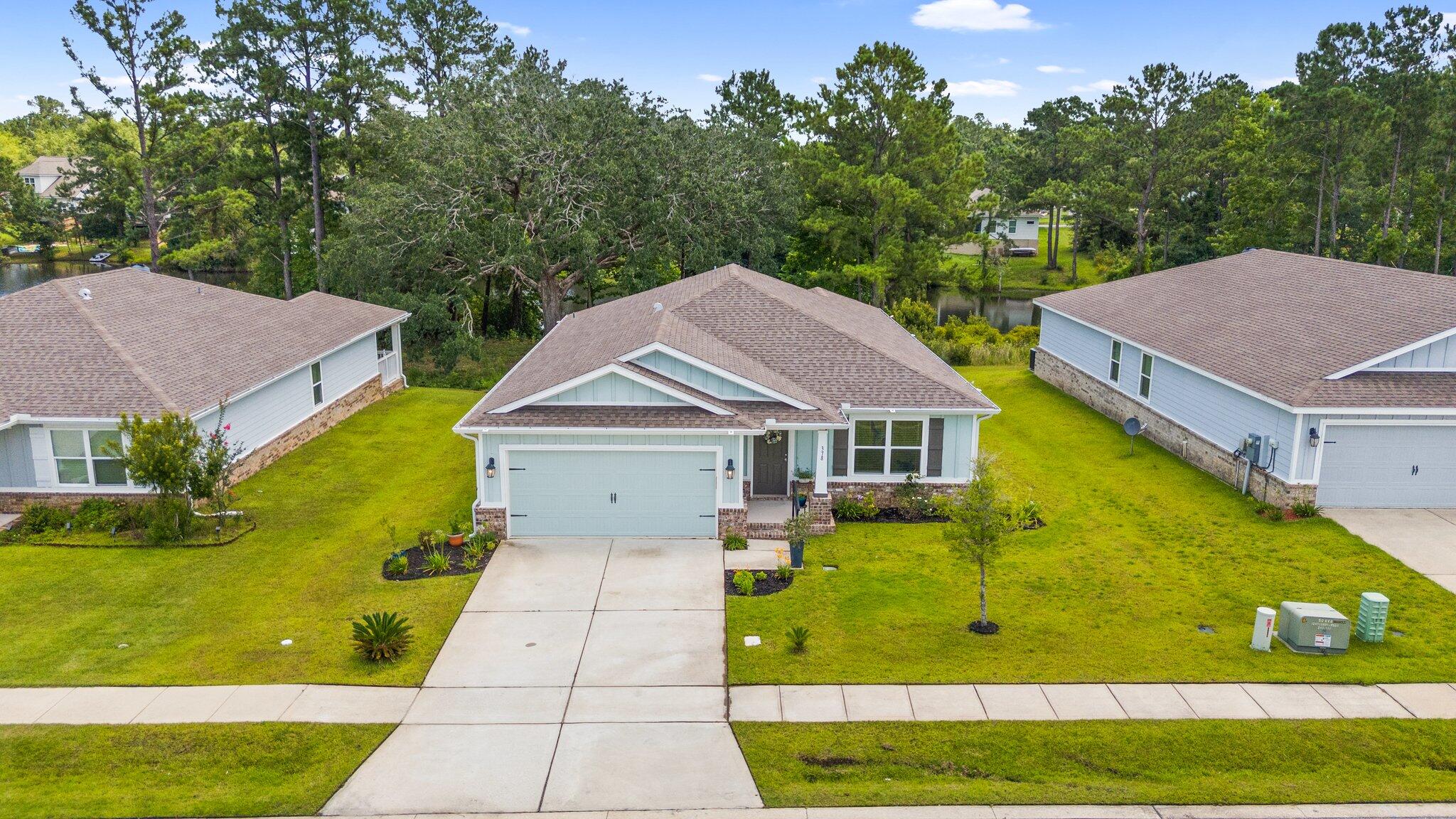 378 Marquis Way Freeport, FL 32439 - Photo 35 of 37 a view of house with garden